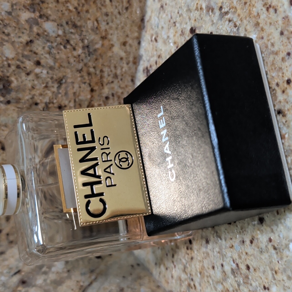 CHANEL Black and Gold Logo Brooch